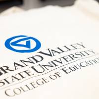 Close up of GVSU college of education shirt